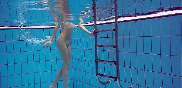 Hot teen Martina swims naked underwater